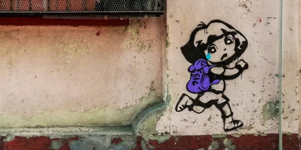 A graffiti of Dora on a wall